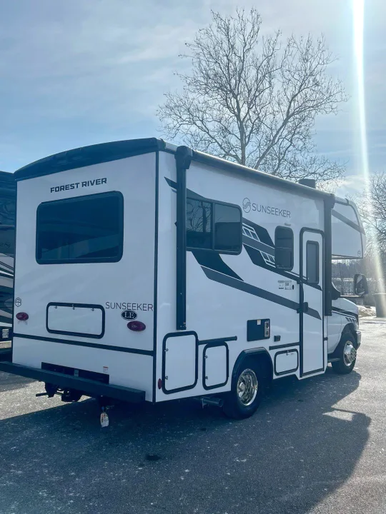 Spacious white Forest River Sunseeker LE RV rental parked outdoors under a bright sky, ready for adventure.. Forest River Sunseeker 2027