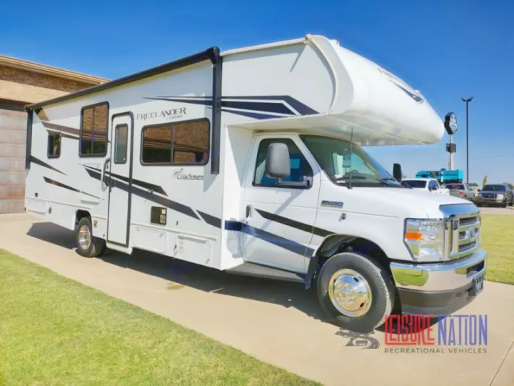 White Class C Coachmen Freelander rv rental with an awning, ready for your next road trip.. Coachmen Freelander 2023