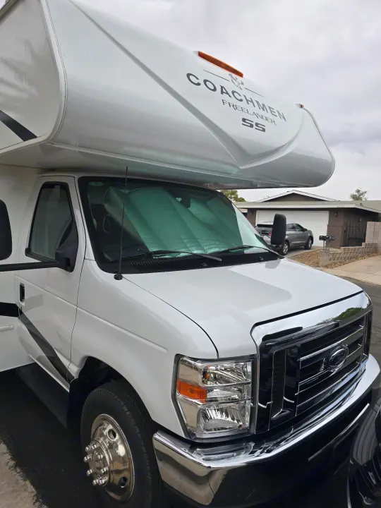 White Coachmen Freelander SS Class C RV rental, parked and ready. Perfect for your next road trip adventure.. Freelander 21QSS 2025