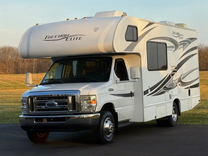 Bright white Class C Freedom Elite RV rental, ready for your next motorhome travel or camping adventure.. Thor Freedom Elite 2012