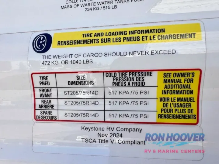 This RV rental info sticker details tire size, pressure (75 PSI), & 1040 lbs max cargo. Vital for safe operation and loading.. Hideout Sport 140RE 2025