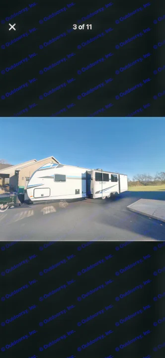 White Sunset Trail RV rental with blue accents & an extended slide-out parked outdoors, ideal for camping adventures.. Crossroads RV Sunset Trail Super Lite 2021