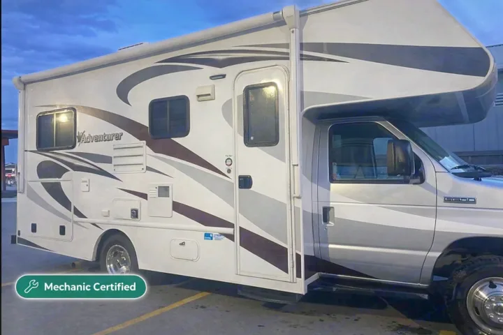 Side view of a clean, white and gray Adventurer RV rental. Perfect for your next motorhome travel adventure.. Adventurer Adventurer Motorhome 2017