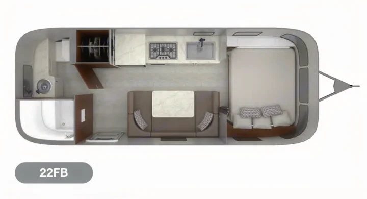 Explore this 22FB RV rental floor plan: a travel trailer with front bed, kitchen, dinette, and rear bath. Perfect for adventure.. Airstream Caravel 2022