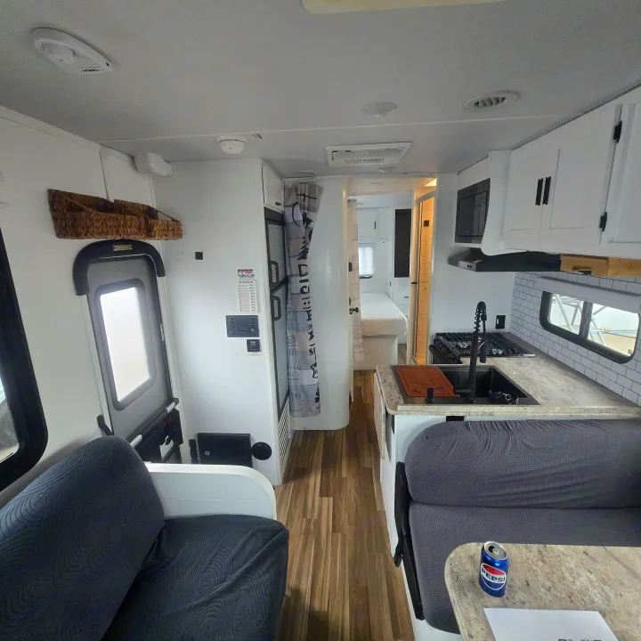 Inside this bright rv rental, a modern kitchen, comfortable dinette, and inviting rear bedroom are ready for your next adventure.. Forest River Coachmen Freelander 2017