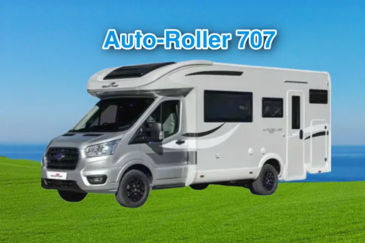 Auto-Roller 707 motorhome, a silver and white campervan for RV rental, parked on vibrant green grass under a blue sky.. Roller Team 707 Auto Roller 2025