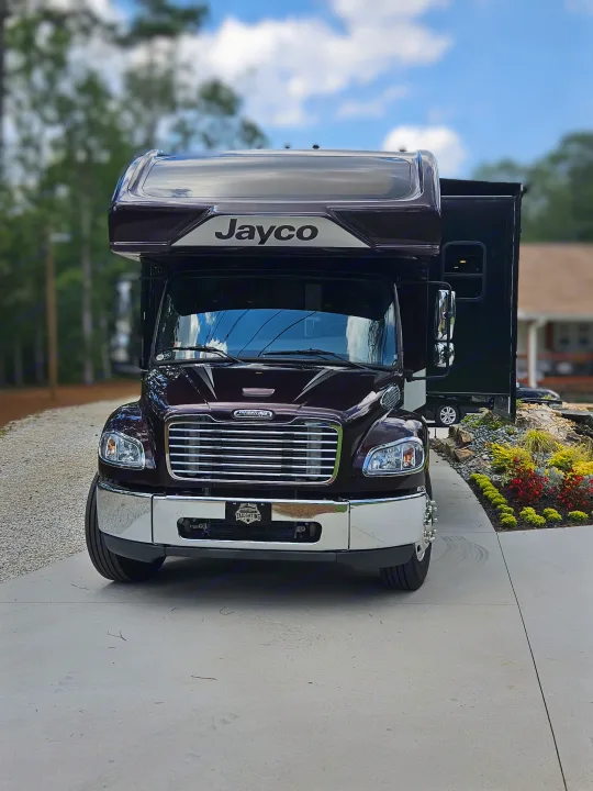 Experience luxury travel! This dark Jayco RV, on a Freightliner chassis, is ready for your next rv rental adventure.. Jayco Seneca 2021