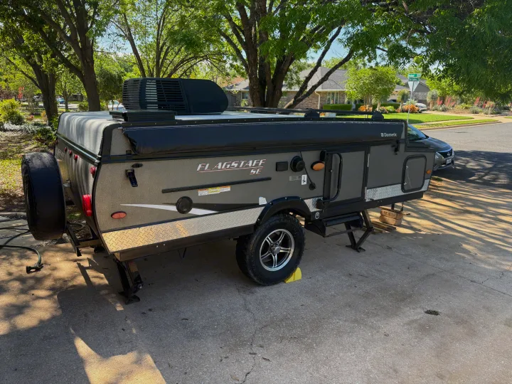 A modern "FLAGSTAFF SE" pop-up travel trailer, fully equipped for your next rv rental camping adventure.. Forest River Flagstaff 2020