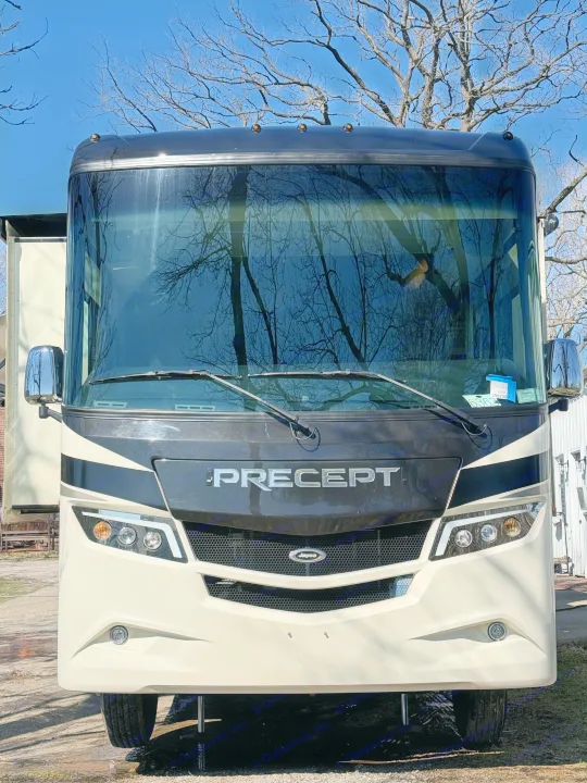 Front view of a cream & black Jayco Precept RV, a spacious motorhome. Consider this great rv rental for your next trip!. Jayco Precept 2021