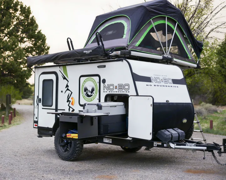 This rugged No Boundaries off-road trailer rv rental with a rooftop tent and awning is perfectly set for adventure camping.. No Boundaries 10 2020