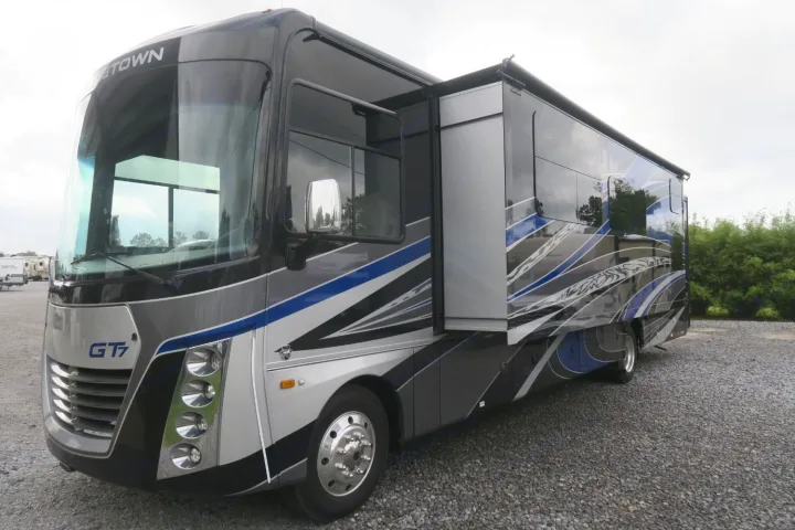Modern Georgetown GT7 class A RV rental with slide-out extended, ready for your next adventure.. Forest River Georgetown 2020