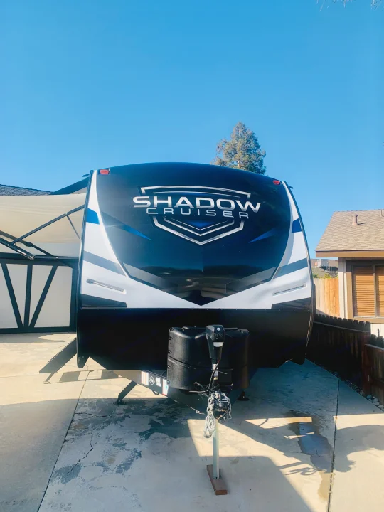 Front view of a black & white Shadow Cruiser travel trailer. Ready for your next RV rental adventure!. Cruiser RV Shadow Cruiser 2023