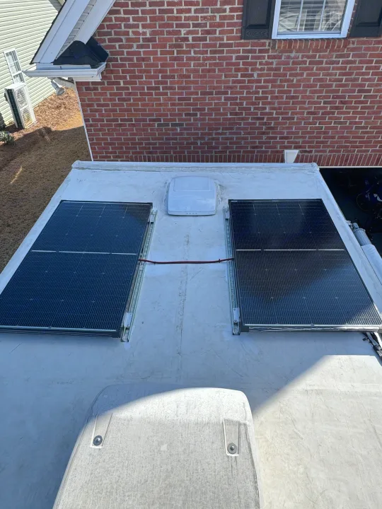 RV rental: Top view of an RV roof with installed solar panels, providing off-grid power for your adventures.. Four Winds 5000 2008