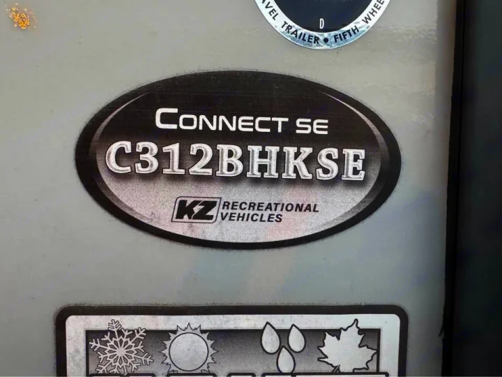 KZ Connect SE C312BHKSE model decal on a recreational vehicle. Key details for an RV rental.. KZ Connect SE 2021