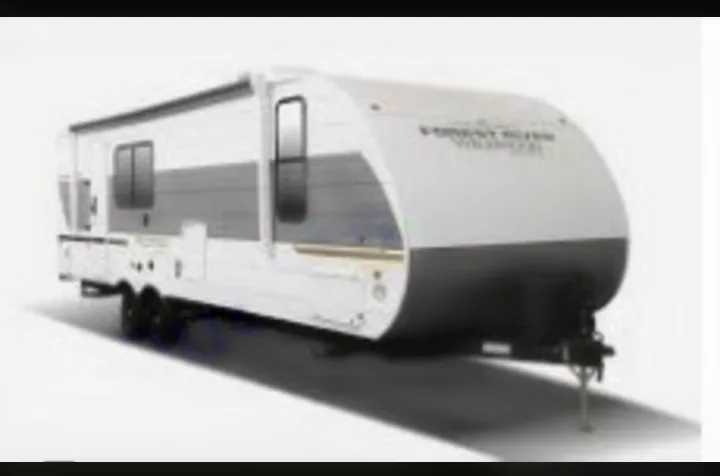 This sleek white & grey travel trailer RV is an ideal rv rental for your next camping adventure or road trip.. Forest River Wildwood X-Lite 2025