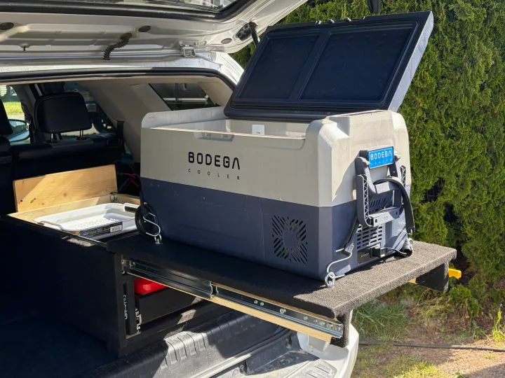 Bodega portable fridge/cooler on slide-out in vehicle trunk, ready for rv rental camping or overland adventure.. Toyota 4Runner 2017