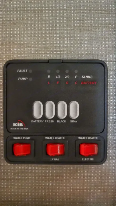 RV rental control panel: monitor tank levels (fresh, black, gray), battery, water pump, and water heater (LP/electric).. Keystone RV Passport Ultra Lite 2019