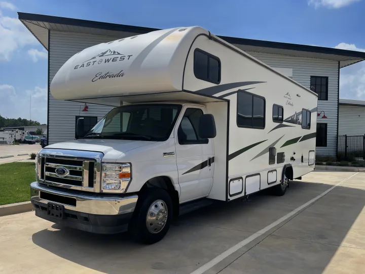 This white East to West Entrada Class C RV rental (Ford E-350 motorhome) is parked, ready for your next adventure.. Entrada Entrada Motorhome 2022