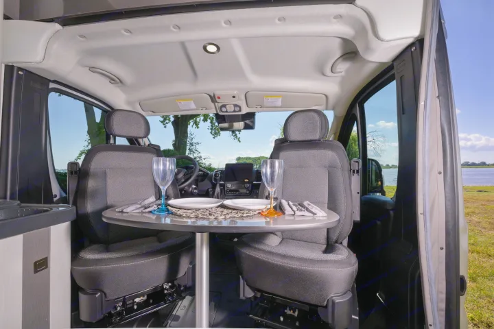 This RV rental's versatile interior features swiveling front seats and a dining table, perfect for scenic meals.. Other Gala Montecarlo 2025