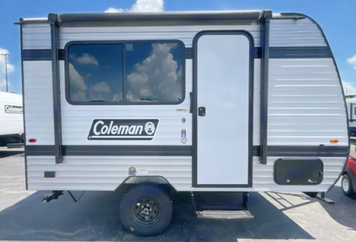 Coleman small travel trailer, ideal for your next RV rental. This compact camping RV offers a comfortable outdoor adventure.. Keystone RV Coleman 2026
