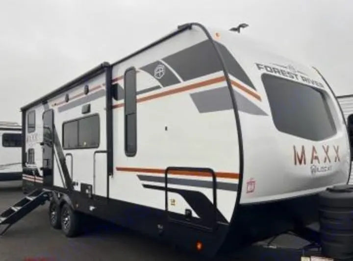 Experience road trips with this modern white & gray Forest River Wildcat Maxx RV rental. Ideal for camping adventures!. Forest River 246DBX 2026