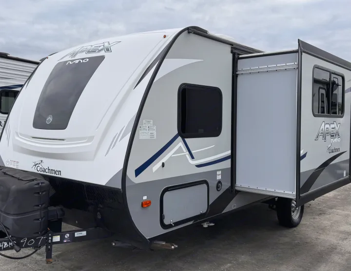 White & gray Coachmen Apex Nano travel trailer with extended slide-out, ideal for rv rental adventures.. Coachmen Apex Nano 2022