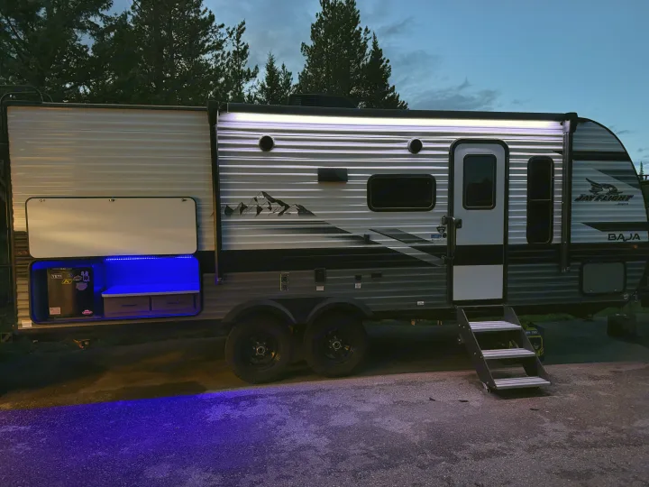 Experience an RV rental! This Jay Flight Baja travel trailer features bright LED exterior lights & a cool blue-lit outdoor kitchen.. Jayco Jay Flight Baja Edition 2024