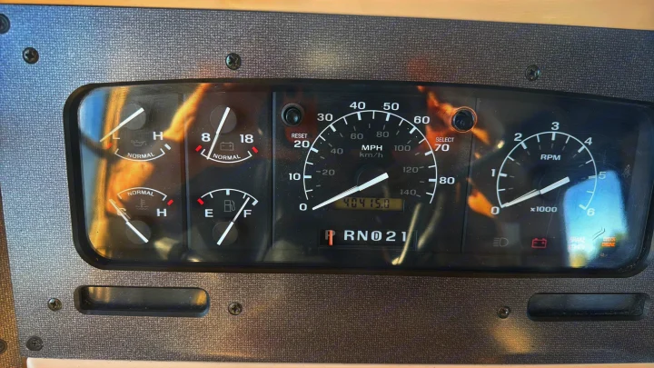 RV rental dashboard: odometer shows 40415.0, with speedometer, tachometer, fuel, temperature, oil, and battery gauges.. Intermountain Rv TROPICAL 1997