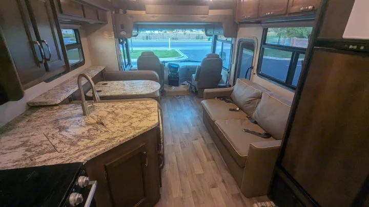 Inside this modern rv rental, you'll find a well-equipped kitchen, comfy dining booth, sofa, and driver's area.. Jayco Alante 2020
