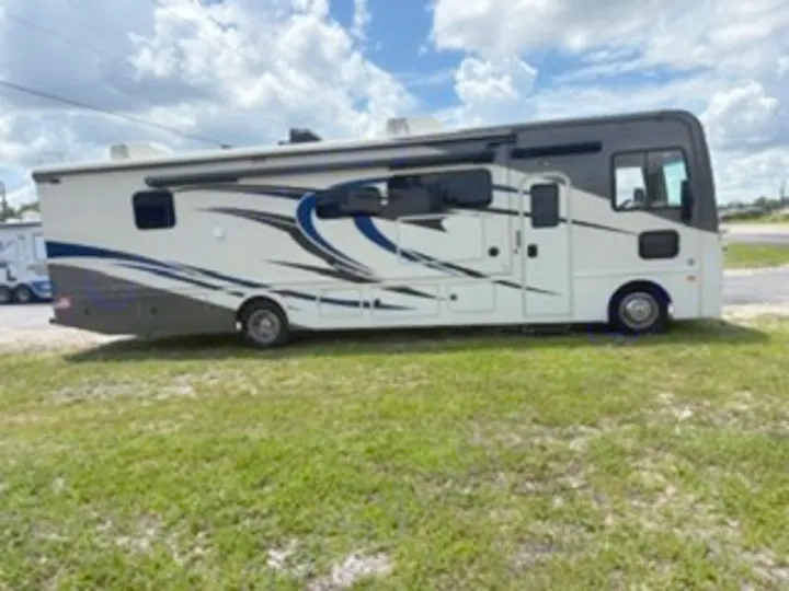 This spacious RV rental, a white and gray motorhome with blue accents, is perfect for your next travel adventure.. Fleetwood FLAIR 2020