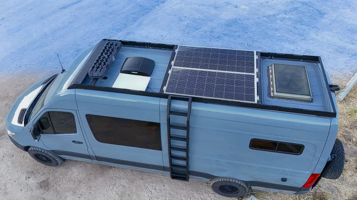 This adventure-ready camper van RV rental features solar panels, a roof rack with recovery boards, and a ladder, perfect for off-grid travel.. MERCEDES-BENZ SPRINTER 2500 170 WB 2022