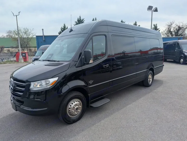 Black Mercedes-Benz Sprinter van, ideal for RV rental or passenger transport, parked on an outdoor lot.. Forest River 2025