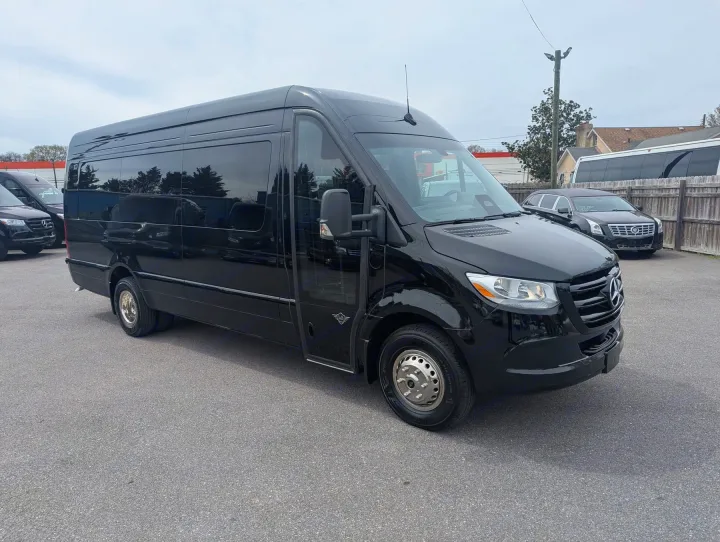Sleek black Mercedes-Benz Sprinter passenger van, perfect for luxury group travel or high-end rv rental experiences.. Forest River 2025