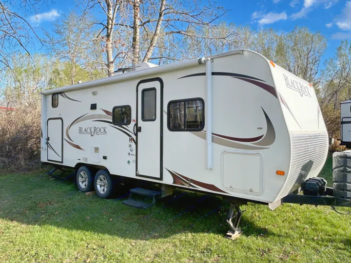 A Black Rock travel trailer ready for your next RV rental outdoor adventure or camping trip.. Outdoors RV 22BHS 2019
