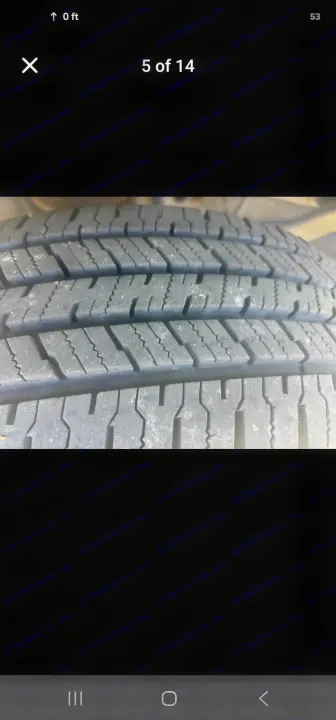 Close-up of a vehicle tire with visible tread, crucial for safe rv rental and reliable travel on road trips.. Thor Majestic 2017