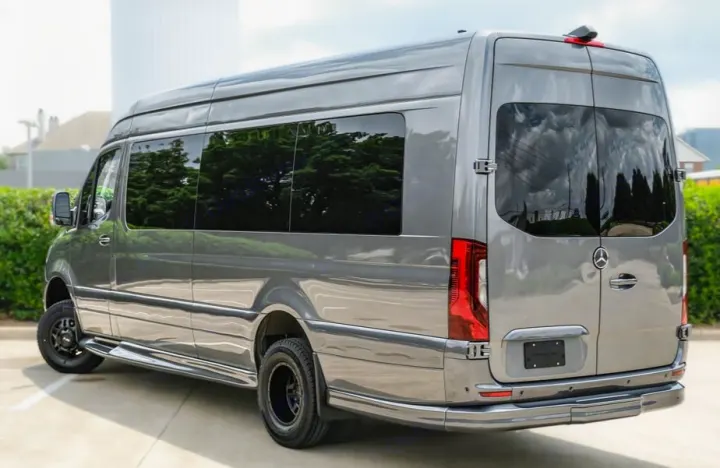 Gray Mercedes Sprinter RV rental van, showcasing its sleek side profile, tinted windows, and rear doors with Mercedes emblem.. W1X8ND6Y3PP555079 MERCEDES BENZ SPRINTER AWD 3500XD 170 2023