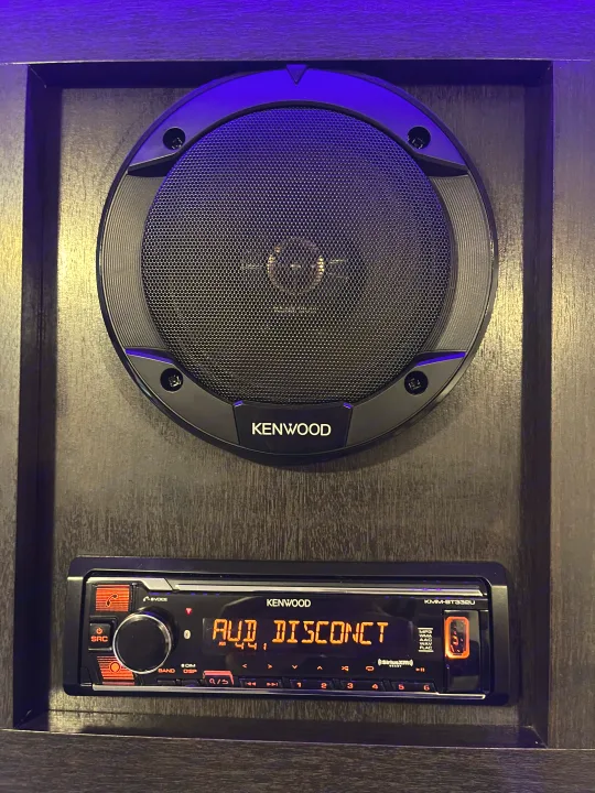 Kenwood audio system (speaker & stereo display showing "AUD, DISCONCT") for entertainment in an RV rental.. Braxton Creek Bushwhacker Plus 2024