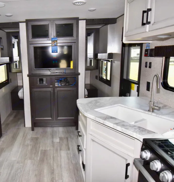 Modern RV rental interior: spacious living, kitchen, dinette, and entertainment for comfortable travel adventures.. Jayco Jay Flight 2023