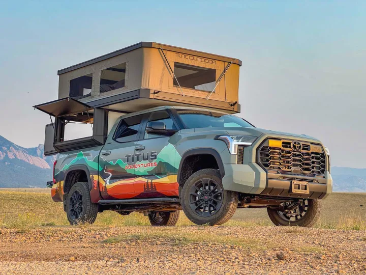 Custom Toyota Tundra truck camper, with a "Titus Adventures" wrap & rooftop tent, perfect for an rv rental outdoor adventure.. Toyota Tundra 2026