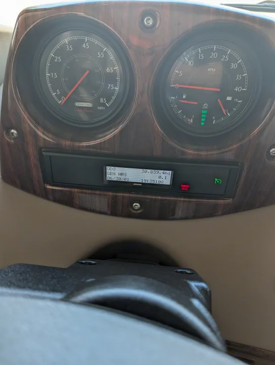 RV rental dashboard: speedometer, tachometer, 30,839 miles, 0.1 gen hrs, & active parking brake light displayed.. Forest River Berkshire 2018