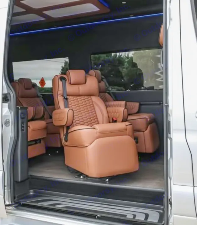 Luxurious RV rental interior, featuring plush brown leather seats with quilted accents. Ideal for comfortable travel.. Mercedes Benz Executive Lounger by Legends Sprinter 3500xd 170 Ext AWD Executive Lounger 2023