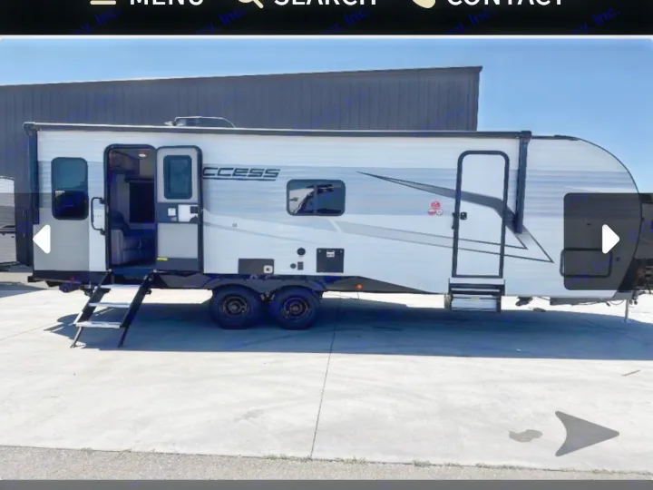 Explore this modern white & gray travel trailer, perfect for an RV rental adventure. Steps lead to an open door.. Winnebago Access 2025