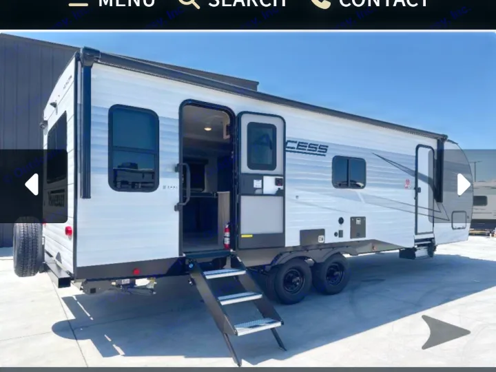 Spacious white travel trailer for RV rental. Open door with steps, ready for your next adventure.. Winnebago Access 2025