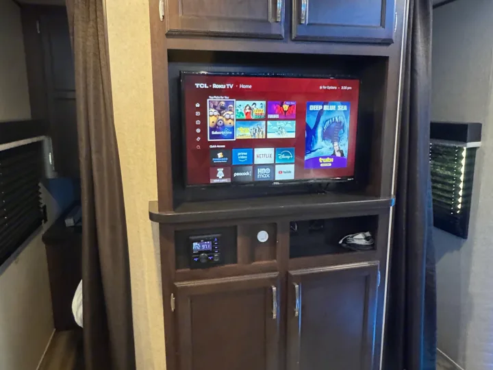 Enjoy entertainment in your rv rental! Roku TV with Netflix, HBO Max & Peacock, plus an audio system, integrated into a wood cabinet.. Jayco Jay Flight SLX 2020