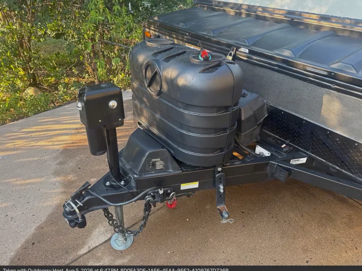 Explore the outdoors! This RV rental features a sturdy hitch, power jack, and propane tanks on the camper trailer front.. Forest River Rockwood ESP 2022