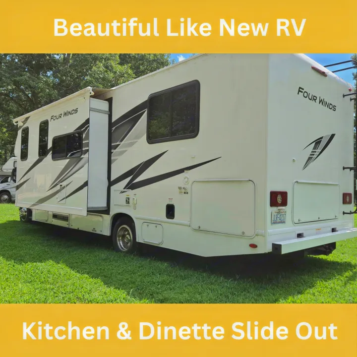 Like new Four Winds RV rental with a large kitchen & dinette slide out for extra space.. Thor Four Winds 2024