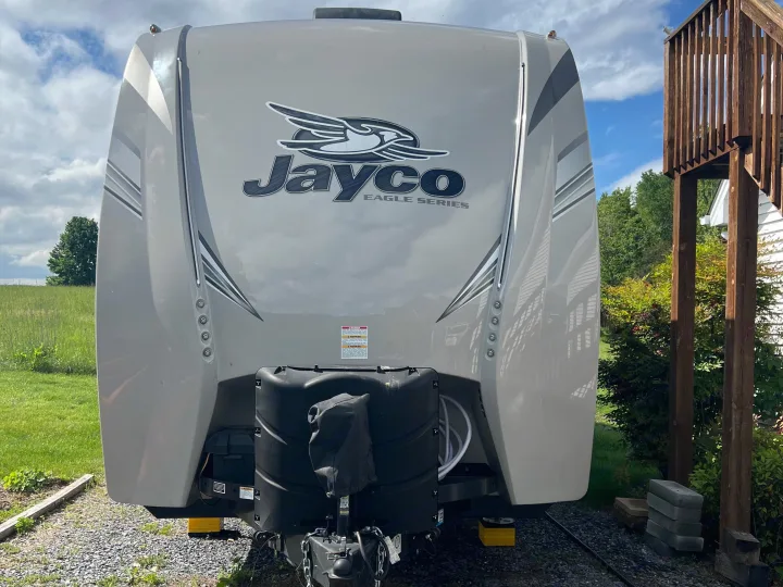 Front of a Jayco Eagle Series travel trailer parked outdoors, ready for your next RV rental adventure.. Jayco Eagle HT 2020