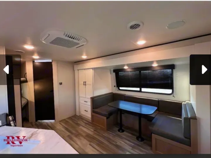 Cozy RV rental interior featuring a dining booth, cabinetry, bunk beds, and modern finishes for a comfortable journey.. Jayco Jay-flight 2026