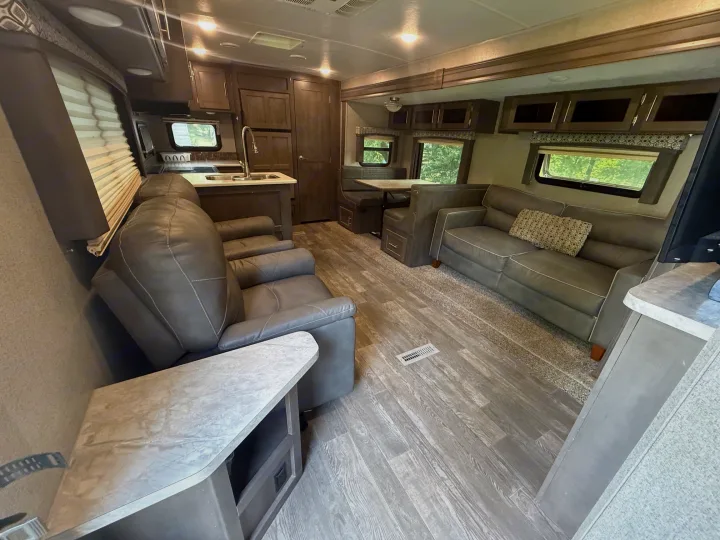 RV rental: Modern gray interior featuring comfortable living room, kitchen, and dinette areas.. Forest River Flagstaff Super Lite 2018
