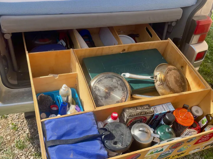 This RV rental features organized pull-out storage drawers, packed with a camping stove, Cuisinart pots, food, and kitchen essentials.. Eurovan Camper Eurovan Camper Class B 2002